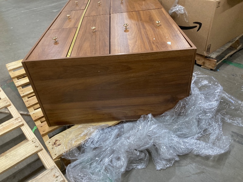 Photo 1 of *Damage to bottom* *LEGS INSIDE DRESSER/Need to disassemble to get to the legs* Dresser, Brown with gold accents