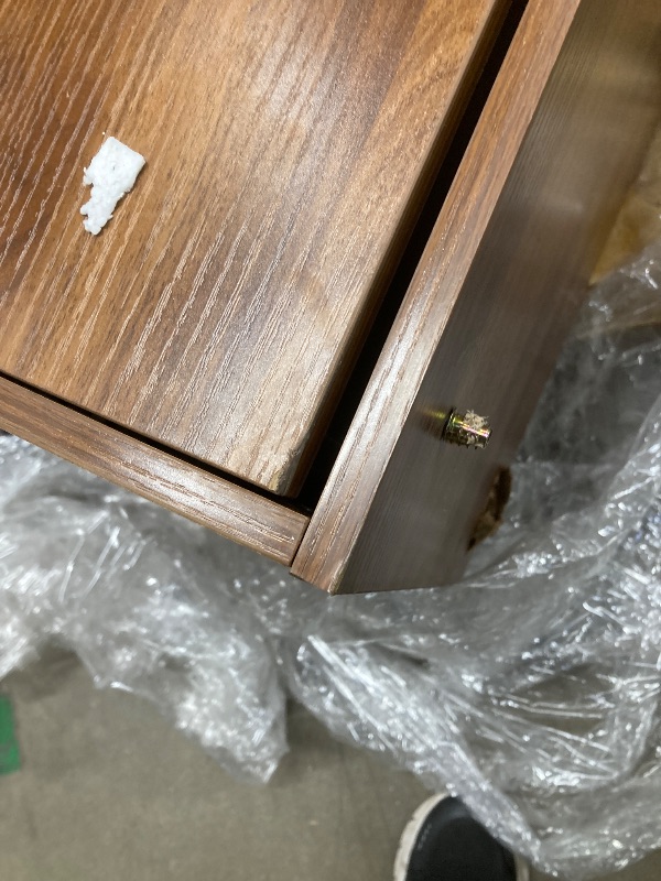 Photo 1 of *Damage to bottom* *LEGS INSIDE DRESSER/Need to disassemble to get to the legs* Dresser, Brown with gold accents