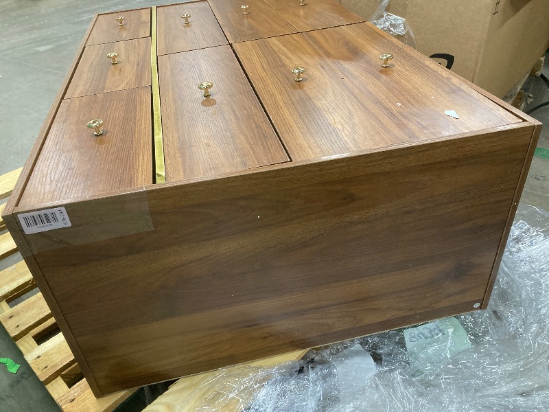 Photo 1 of *Damage to bottom* *LEGS INSIDE DRESSER/Need to disassemble to get to the legs* Dresser, Brown with gold accents