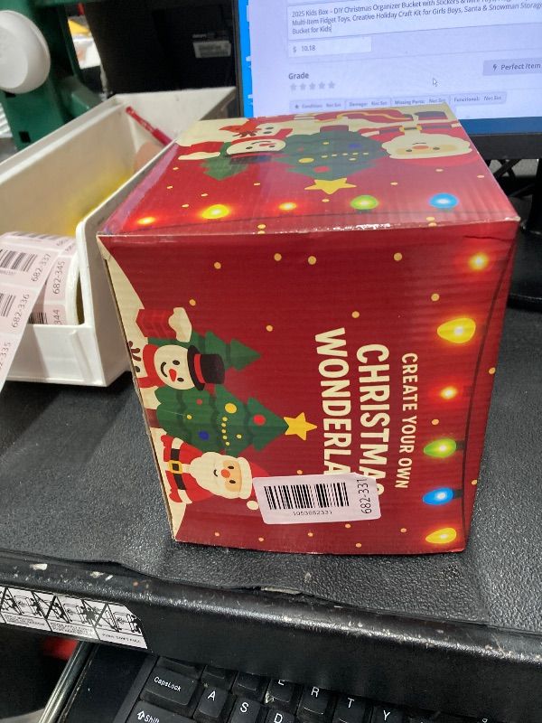 Photo 1 of 2025 Kids Box – DIY Christmas Organizer Bucket with Stickers & Mini Toys, Fidget Toy Pack, Multi-Item Fidget Toys, Creative Holiday Craft Kit for Girls Boys, Santa & Snowman Storage Bucket for Kids