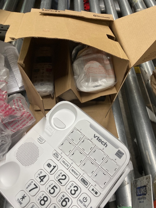 Photo 1 of **IT IS USED, IT IS UNKNOWN IF ANY PARTS ARE MISSING, AND IT IS UNKNOWN IF IT WORKS 100%.****VTech SN5147 Amplified Corded/Cordless Senior Phone with Answering Machine, Call Blocking, 90dB Extra-Loud Visual Ringer, One-Touch Audio Assist on Handset up to 