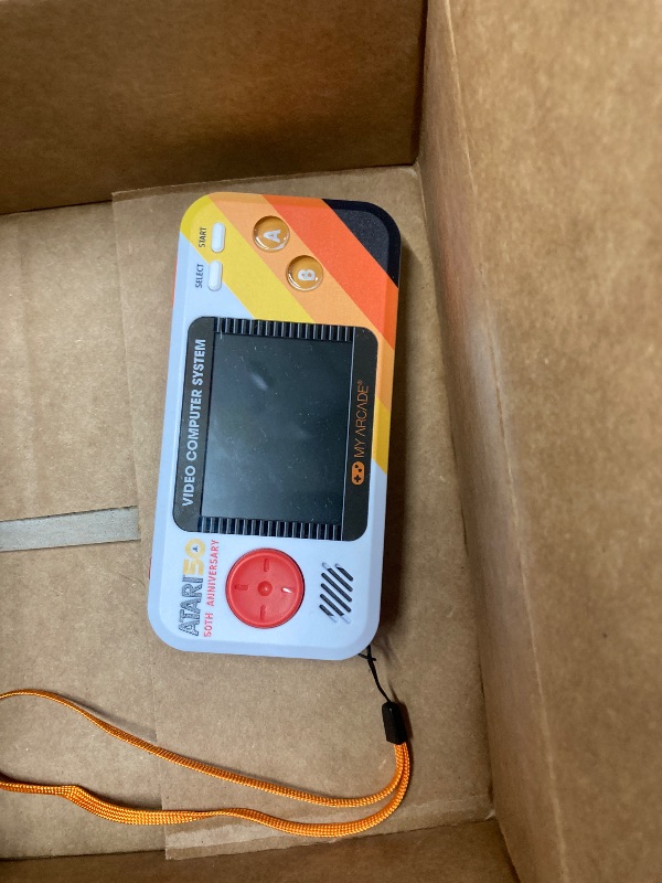 Photo 1 of ***It's used, it's unknown if any parts are missing, and it's unknown if it works 100%.*****My Arcade Atari Pocket Player Bundle: Portable Video Game Console with 100 Games, Travel Case and Screen Protector Included