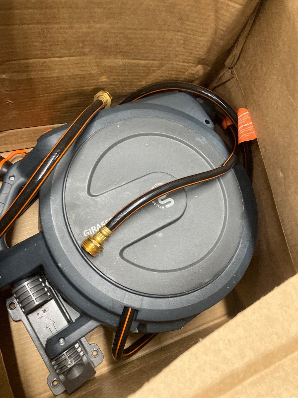 Photo 1 of **It's used, it's missing a part, and it's unknown if it works 100%.****Giraffe Tools AW30 Wall Mounted 1/2" x 100 ft Garden Hose Reel, Retractable Water Hose Reel, Automatic Rewind & Lock at Any Length