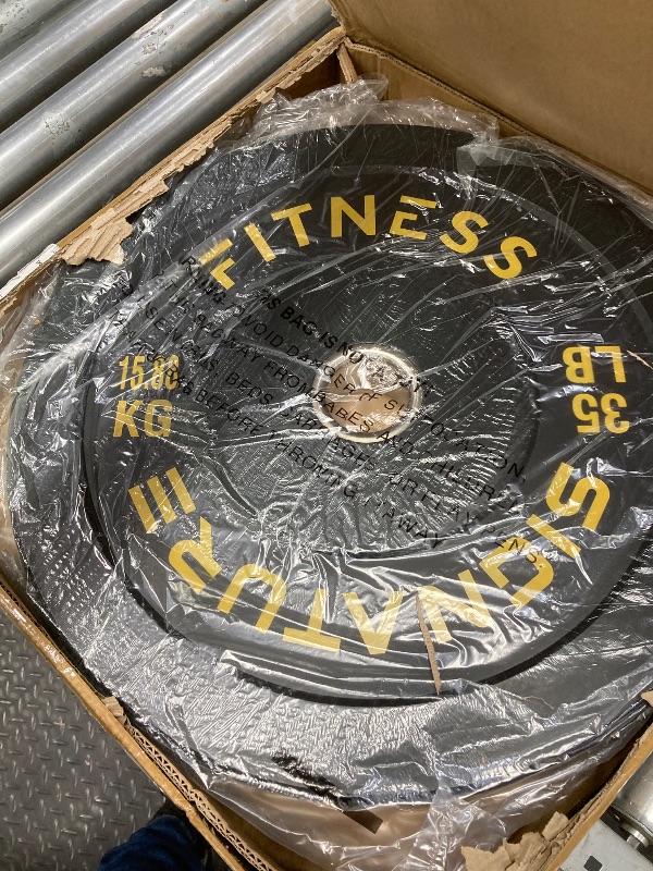 Photo 1 of *HEAVY* Signature Fitness 35 lb Olympic Weight