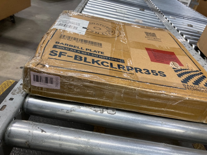 Photo 1 of *HEAVY* Signature Fitness 35 lb Olympic Weight