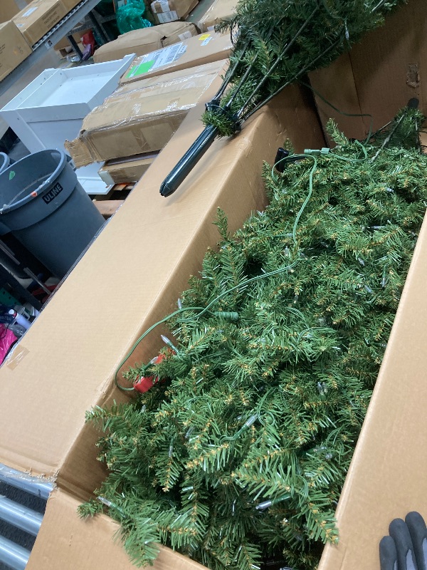 Photo 1 of *Missing piece to test lights* National Tree Company 7.5 ft Pre-Lit Dunhill Fir Artificial Christmas Tree, 700 Clear Lights, 2,154 Tips, Foot Pedal, 10 Light Function, Includes Stand, Green