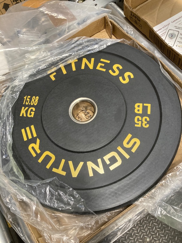 Photo 1 of *HEAVY* Signature Fitness 35 lb Olympic Weight