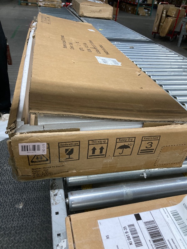 Photo 1 of *Minor Damage to piece(s)* Fluted TV Stand