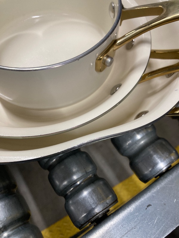 Photo 1 of ***DAMAGE -BENT/DENTED -SELLING AS IS*** Martha Stewart Lockton Premium Non stick Non Toxic PFA Free Ceramic Interior 10 Piece Heavy Gauge Enamel Aluminum Pots and Pans Cookware Set - Linen White w/Gold Handle