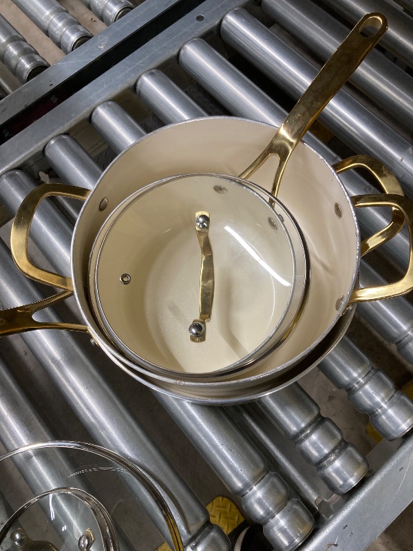 Photo 1 of ***DAMAGE -BENT/DENTED -SELLING AS IS*** Martha Stewart Lockton Premium Non stick Non Toxic PFA Free Ceramic Interior 10 Piece Heavy Gauge Enamel Aluminum Pots and Pans Cookware Set - Linen White w/Gold Handle