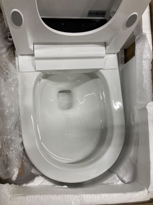 Photo 1 of **DAMAGED SEAT***Smart Toilet with Powerful Flush, 1000 Gram MaP Flush Score, Foot Sensor Operation Walk Away, ADA Comfort Chair Height, LED Display ?