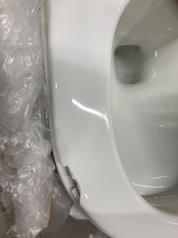 Photo 1 of **DAMAGED SEAT***Smart Toilet with Powerful Flush, 1000 Gram MaP Flush Score, Foot Sensor Operation Walk Away, ADA Comfort Chair Height, LED Display ?