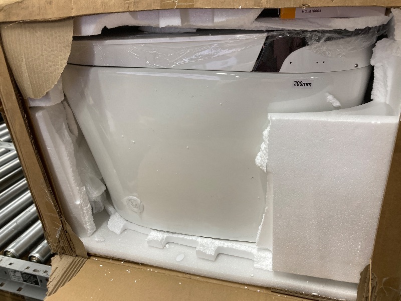 Photo 1 of **DAMAGED SEAT***Smart Toilet with Powerful Flush, 1000 Gram MaP Flush Score, Foot Sensor Operation Walk Away, ADA Comfort Chair Height, LED Display ?