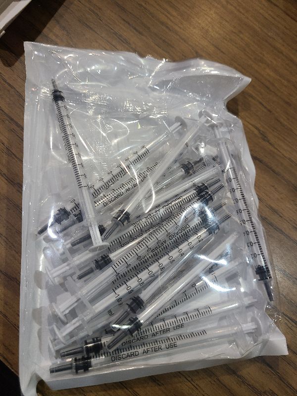 Photo 1 of 20 Pack 1ml Syringe with Cap for Liquid, 1cc Plastic Small Syringes with Cover, Non-Sterile, No Needle