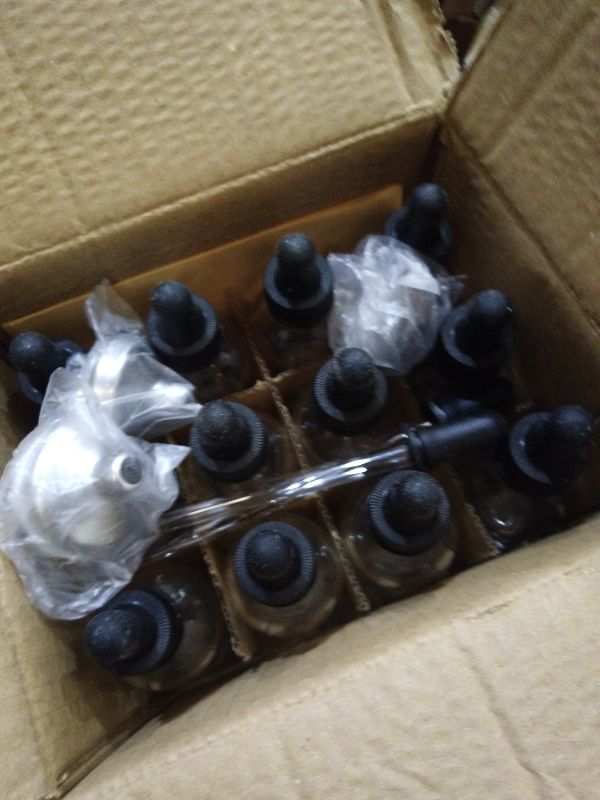 Photo 1 of 12 Pack, 2 oz Glass Eye Dropper Bottles w/ 3 Stainless Steel Funnels & 1 Long Pipette Dropper & 24 Labels - 60ml Clear Tincture Bottles for Essential Oils, Liquids - Leakproof Travel Essential Bottles