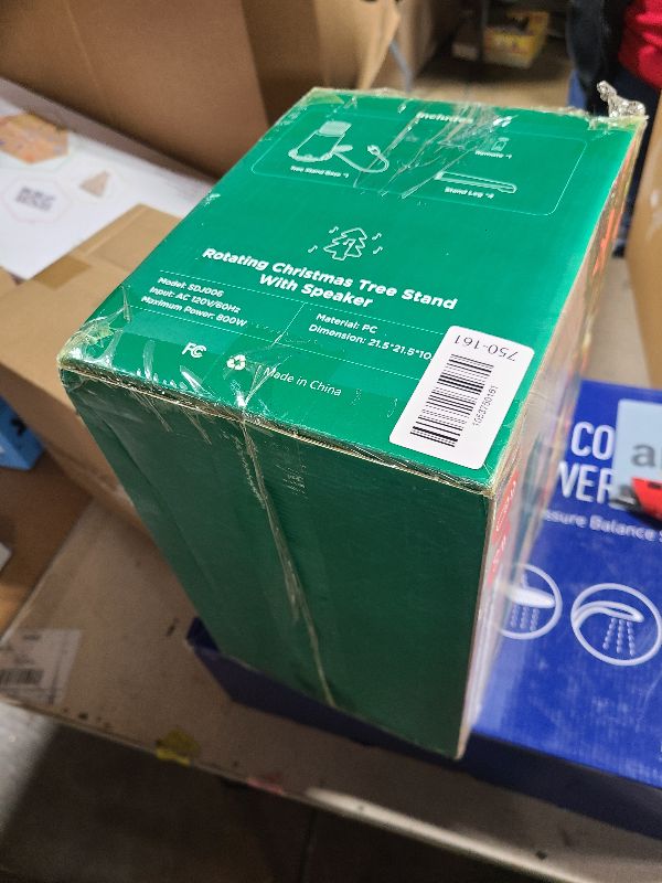 Photo 1 of ?Patent Pending? Musical Rotating Christmas Tree Stand, UL Certified Up to 9ft 120 lb Artificial Christmas Tree with Speaker, Spinning Stand with Remote, Fit for 1.25-2" in Tree Poles - 800W