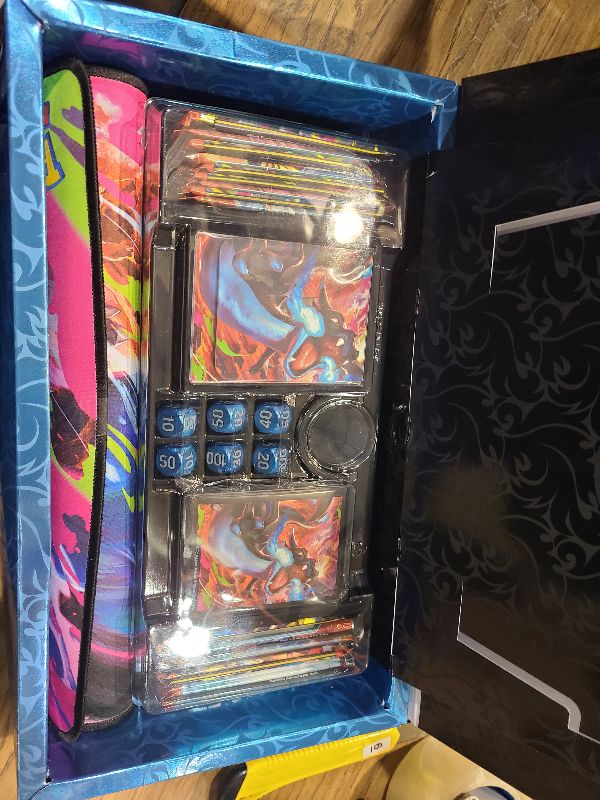 Photo 1 of **OPENED PACKS**Pokémon TCG: Mega Charizard X ex Ultra-Premium Collection