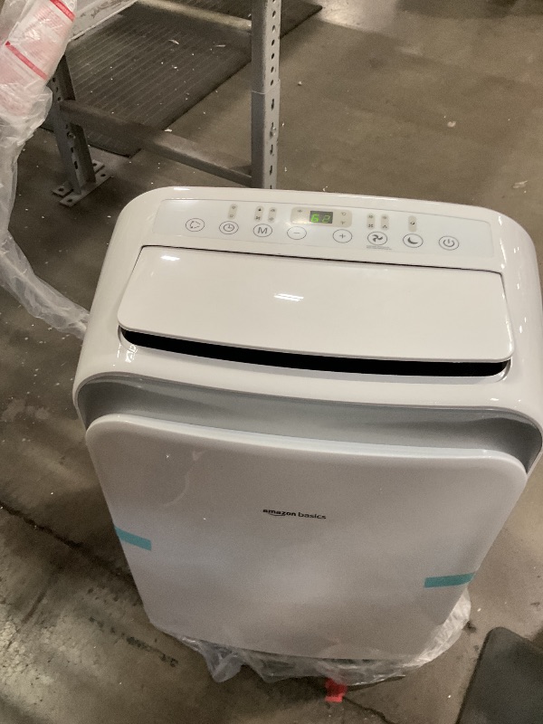 Photo 1 of *MISSING SOME ACCESSORIES/POWERS ON*** Amazon Basics 3-In-1 Portable Air Conditioner, 12000 BTU (ASHRAE), Cools Up to 550 Sqf, Portable AC with Cool/Dry (Dehumidifier)/Fan-Only Functions, Auto Mode, Sleep Mode, Timer, White