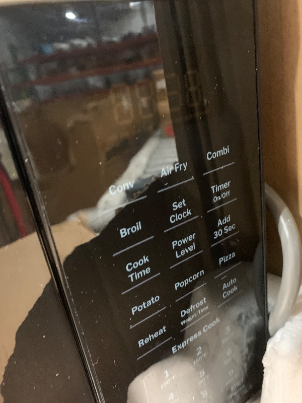 Photo 1 of (sold for parts) GE GCST10A1WSS 4-in-1 Microwave Oven, 1,050 Watts Air Fryer, Broiler & Convection Mode, Child-Lock Technology