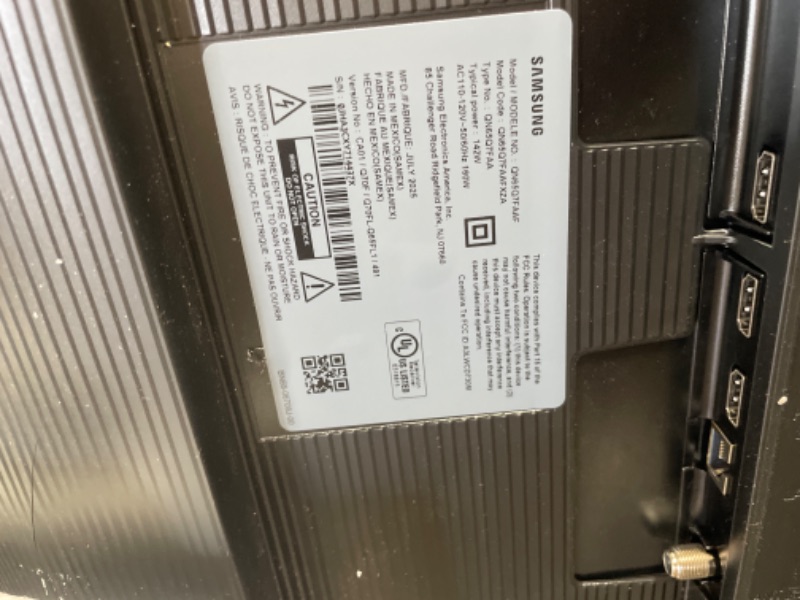Photo 1 of ***DAMAGED***Samsung 65-Inch Class QLED Q7F Series Samsung Vision AI Smart TV (2025 Model, 65Q7F) Quantum HDR, Object Tracking Sound Lite, Q4 AI Gen1 Processor, 4K upscaling, Gaming Hub, Alexa Built-in