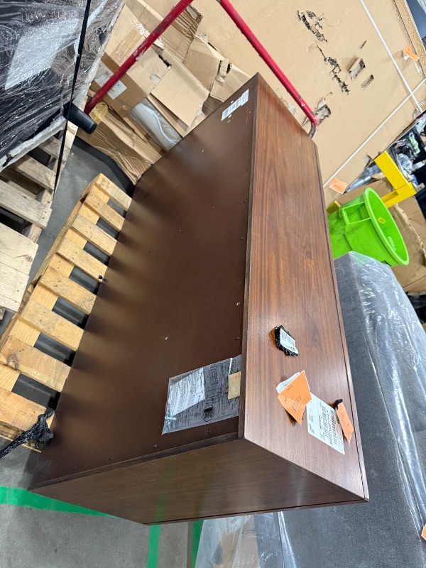 Photo 1 of ***DAMAGED***Signature Design by Ashley Lyncott Mid-Century Modern 6-Drawer Dresser with Safety Stop and Felt Lined Top Drawers, Dark Brown