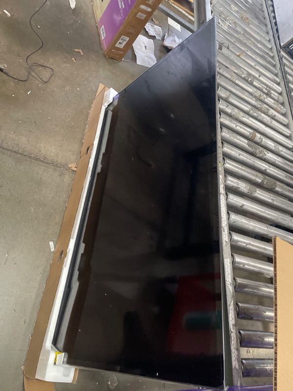 Photo 1 of ***DAMAGED***Roku Smart TV 2025 – 65-Inch Select Series, 4K HDR TV – RokuTV with Enhanced Voice Remote – Flat Screen LED Television with Wi-Fi for Streaming Live Local News, Sports, Family Entertainment