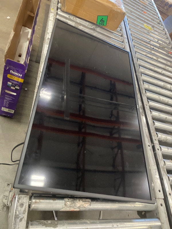 Photo 1 of ***DAMAGED***Roku Smart TV – 40-Inch Select Series 1080p Full HD RokuTV with Roku Voice Remote, Bright Picture, Customizable Home Screen – Live Local News, Sports, Gaming