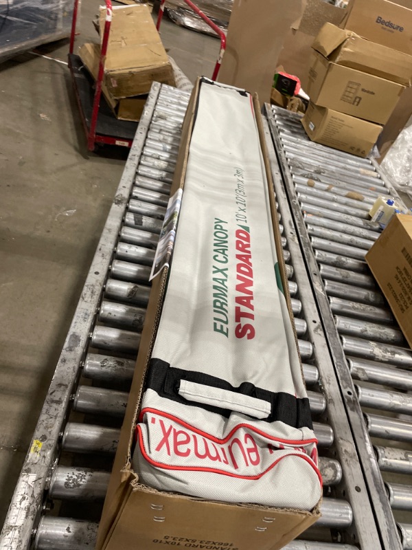 Photo 1 of *****************Doesn’t full open, and canvas is very torn**************
Eurmax USA Standard 10x10ft Patio Pop Up Canopy Tent for Outdoor Events Commercial Instant Canopies with Heavy Duty Roller Bag,Bonus 4 Canopy Sand Bags (White)