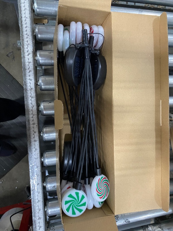 Photo 1 of ***(USED/ UNABLE TO TEST)***4 Pack 8 Patterns Christmas Decorations with 32 Lollipop Christmas Lights, Solar Christmas Lights Outdoor Waterproof with 8 Modes, Christmas Peppermint Candy Pathway Yard Decor for Garden/Lawn/Patio