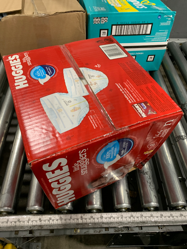 Photo 1 of ****READ NOTES BEFORE BIDDING, OPEN PACKAGES/INCOMPLETE****
Huggies Size Newborn Diapers, Little Snugglers Baby Diapers, Size Newborn (up to 10 lbs), 144 Count, Packaging May Vary