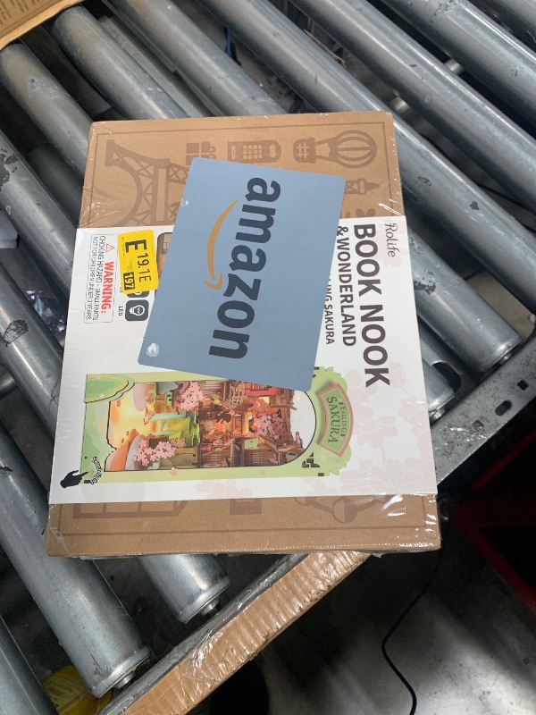 Photo 1 of ****MISSING ASSEMBLY PIECES**** Rolife DIY Book Nook Kit Falling Sakura, DIY Miniature Booknook Kit Creative Decorative Bookend Bookshelf Insert 3D Puzzle for Adults, Halloween/Christmas Decorations/Gifts for Adults (Falling Sakura)