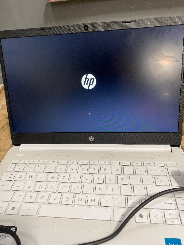 Photo 1 of ***LCOKED NEEDS PIN****
HP 14 Laptop, Intel Celeron N4020, 4 GB RAM, 64 GB Storage, 14-inch Micro-edge HD Display, Windows 11 Home, Thin & Portable, 4K Graphics, One Year of Microsoft 365 (14-dq0040nr, Snowflake White)