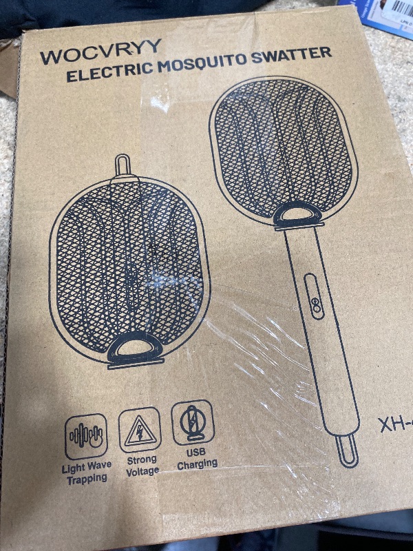 Photo 1 of **NOT FUNCTIONAL WITH FLIES** WOCVRYY Electric Fly Swatter Foldable Bug Zapper Racket with 4000V 1800mAh Rechargeable Battery 5-Layer Safety Mesh Dual Modes with Mosquito Light Suitable for Indoor or Outdoor Use (White)