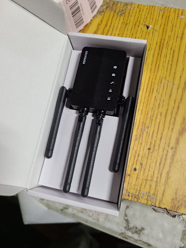 Photo 1 of 12880 Sq.Ft WiFi Extender Signal Booster, 1200Mbps WiFi Repeater, 105-Device Support, Simple Install, WiFi Extender with Wide Compatibility