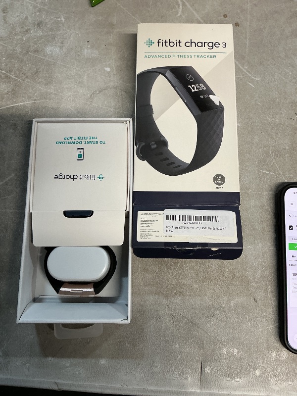 Photo 1 of ***Heavily Used***
Fitbit Charge 3 Fitness Activity Tracker, Graphite/Black, One Size (S and L Bands Included)