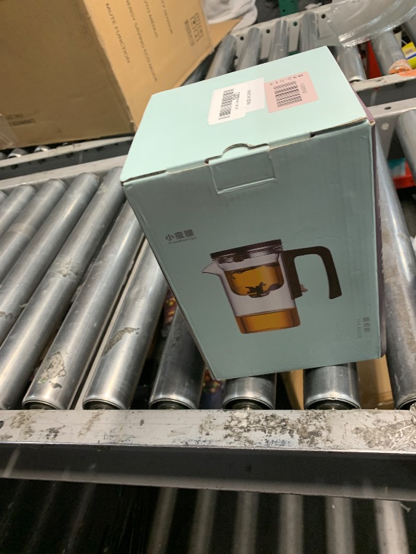 Photo 1 of Enchanti Magic Tea Pot, 900ML Water Separation Glass Teapot with Wooden Handle, Press Control Enchanti Tea Infuser with Strainer for Loose Leaf Witchcraft Tea Kettle