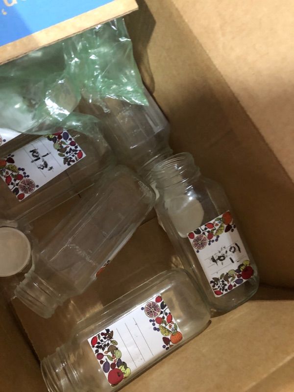 View 3 of ***MISSING PARTS*** USED
8 Pack 16 Oz Reusable Glass Milk Bottles w 100% Airtight Heavy Duty SCREW Lid & 2 Pour Spouts - Glass Juice Bottles w Capacity Mark - Beverage Drinking Jar Juice Container Breast Milk(Extra 2 Lids)