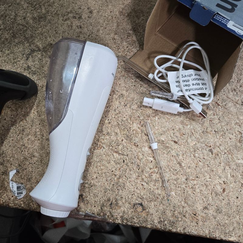 Photo 1 of **USED**** Waterpik Cordless Pearl Rechargeable Portable Water Flosser for Teeth, Gums, Braces Care and Travel with 4 Flossing Tips - ADA Accepted, WF-13 White, Packaging May Vary