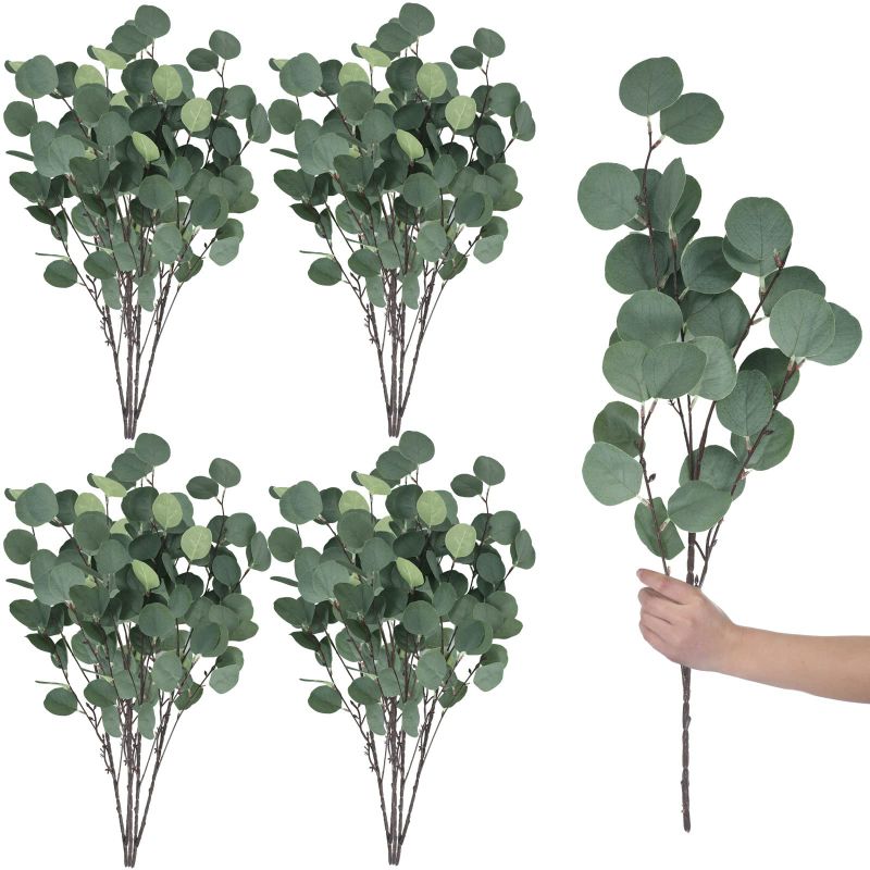 Photo 1 of *** RETAIL PRICE $31.54**
20 Pcs Artificial Eucalyptus Stems Fake Bulk Eucalyptus Faux Greenery Silver Dollar Leaves 23.6 Inches Silver Dollar Fake Plant Decor Silk Branches Artificial Greenery Branches Plant for Wedding Decor