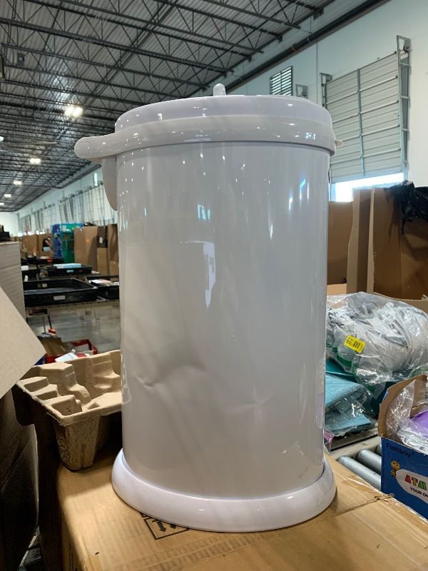 Photo 1 of ***ITS NEW, JUST HAVE A MINR DAMAGE ON SIDE****Ubbi Steel Diaper Pail, Odor Locking, No Special Bag Required, Award-Winning, Registry Must-Have, White