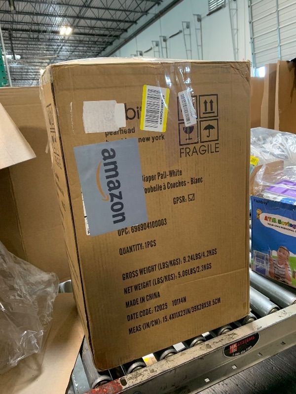 Photo 1 of ***ITS NEW, JUST HAVE A MINR DAMAGE ON SIDE****Ubbi Steel Diaper Pail, Odor Locking, No Special Bag Required, Award-Winning, Registry Must-Have, White