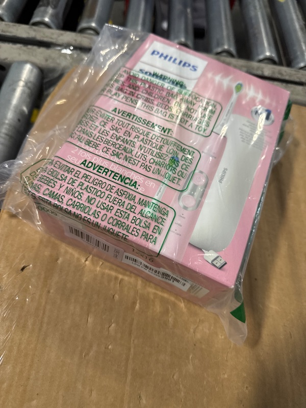 Photo 1 of **MISSING BRISSEL ATTACHMENT**
Philips Sonicare ProtectiveClean 6500 Rechargeable Electric Toothbrush, with Pressure Sensor, 3 Cleaning Modes, SmarTimer and QuadPacer, 14-Day Battery Life, Charging Travel Case, Pink, HX6462/06