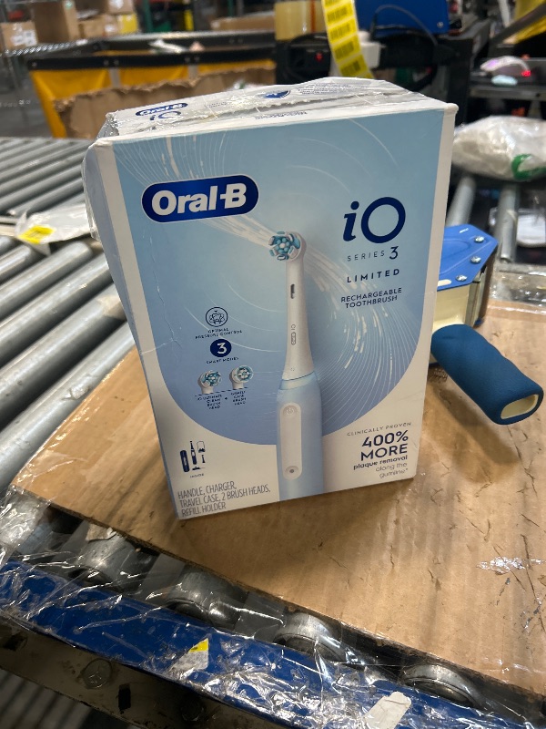 Photo 2 of Oral-B iO Deep Clean Rechargeable Electric Powered Toothbrush, Icy Blue with iO Series 3 Limited, 2 Brush Heads and Travel Case - Pressure Sensor to Protect Gums - 3 Cleaning Settings - 2 Minute Timer