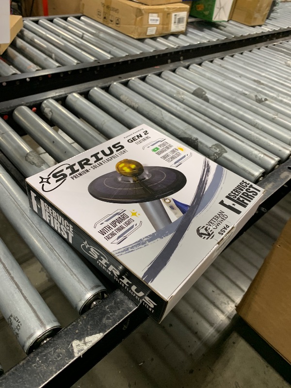 Photo 1 of Service First Sirius Solar Flagpole Light - Ultra Bright - Weather Proof Design - 12 Hour Battery Life - Automatic Sun Detection - Fits Most Flagpoles (Freedom Edition Black)