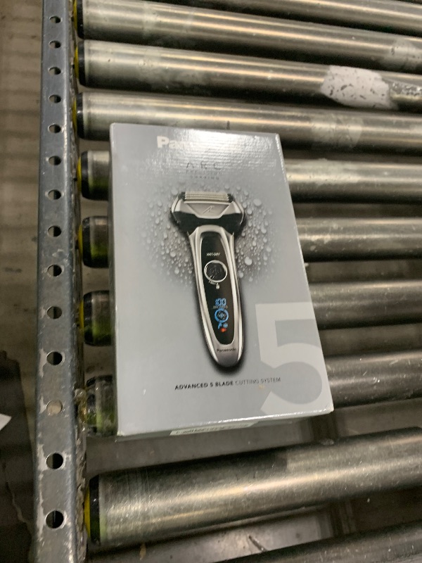 Photo 1 of Panasonic ARC5 Electric Razor for Men with Pop-Up Trimmer, Wet/Dry 5-Blade Electric Shaver with Intelligent Shave Sensor and Multi-Flex Pivoting Head – ES-LV65-S (Silver)