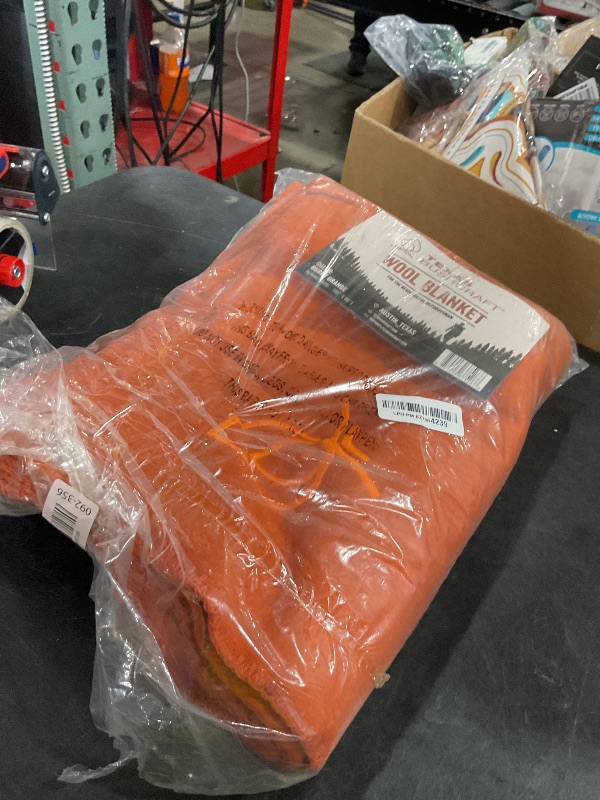 Photo 1 of Texas Bushcraft Merino Wool Blanket for Camping Hiking and Backpacking – Water Fire Resistant Camp Car is Fast-Warming Durable with Double-Stitched Edging (66” x 90”) Burnt Orange
