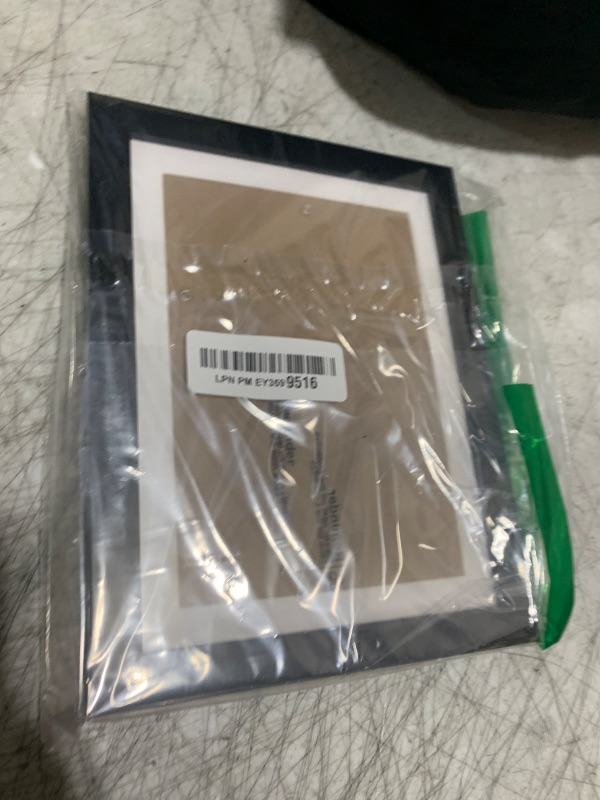 Photo 1 of Fxojyvo 6x8 Picture Frame, Display Photo 5x7 with Mat or 6 x 8 Without Mat, Light Weight and High Transparent 6 by 8 Frame for Wall - 1 Pack/Black/6"x8"