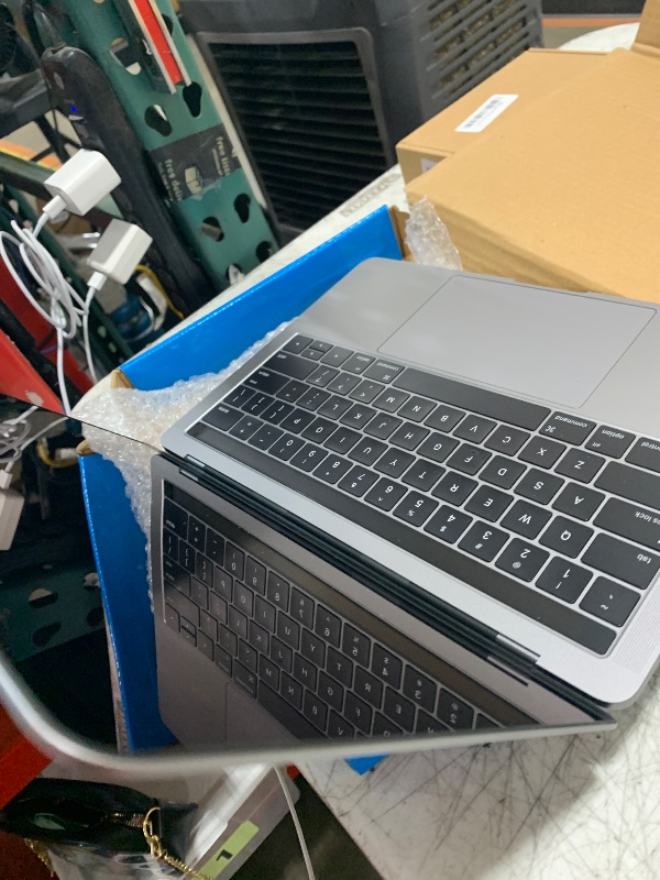 Photo 1 of Apple MacBook Pro with Retina display Touch Bar, 2.9GHz Dual-core Intel Core i5, (13-inches, 8GB Memory, 512GB) - Space Gray (Renewed)