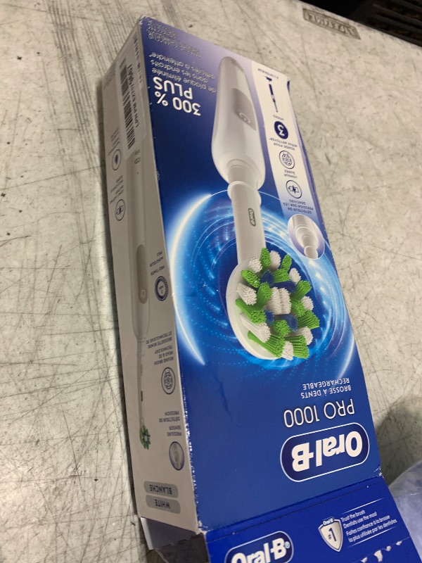 Photo 1 of Oral-B Pro 1000 Rechargeable Electric Toothbrush, White