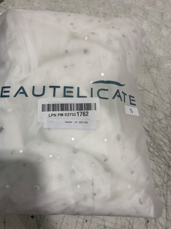 Photo 1 of Homiest Glitter Tulle Fabric Rolls with Star Moon Sequin, 10 Yards x 54 Inch Wide Tulle Bolt White Tulle Rolls Bulk, Tulle Netting Fabric for Tutu Skirt Bridal Veil Wedding Arch Party Decorations